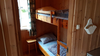 Cabin number 7 - bedroom with bunk beds. The beds are 190cm (75 inches) long